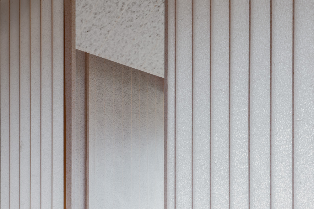 Detail of the shoji walls made from recycled washi paper that was originally destined for disposal. Photo: Keishin Horikoshi / SYMBOLPLUS